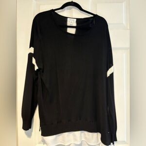 Woman’s knit top with blouse tail